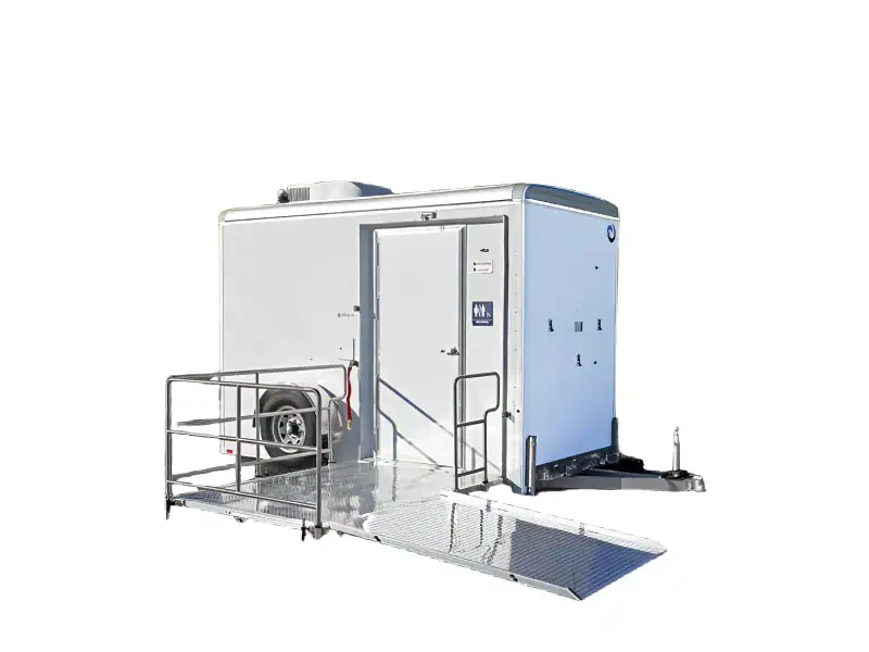 The ADA Single Restroom and Restroom Shower Trailer features a ramp for wheelchair accessibility, a closed door, and a unisex restroom sign.