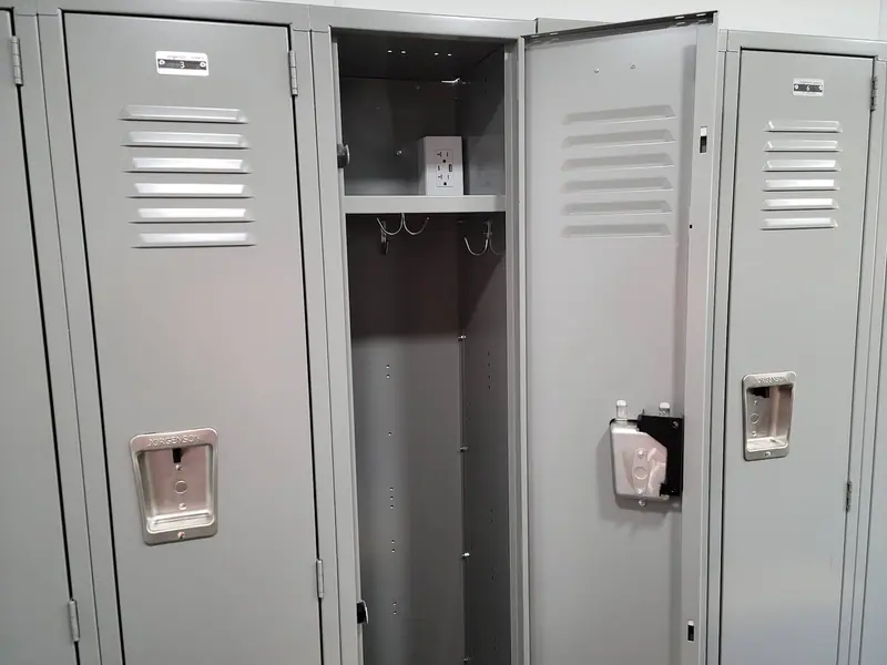 Open locker with hooks and a shelf