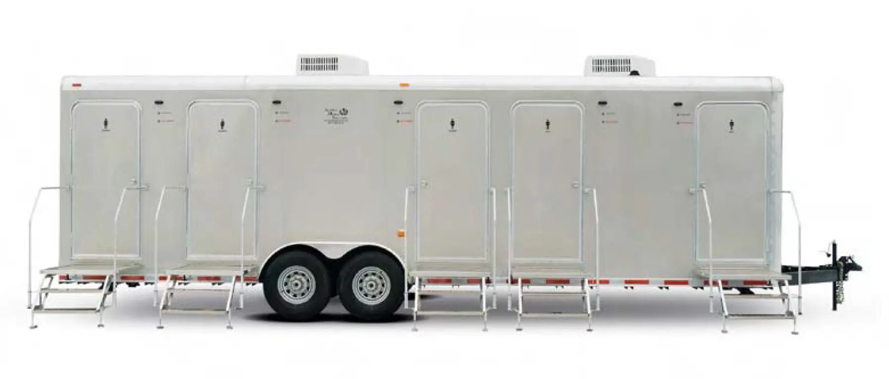 A large, white shower restroom trailer with five separate doors and stairs, two wheels, and three air conditioning units on top.