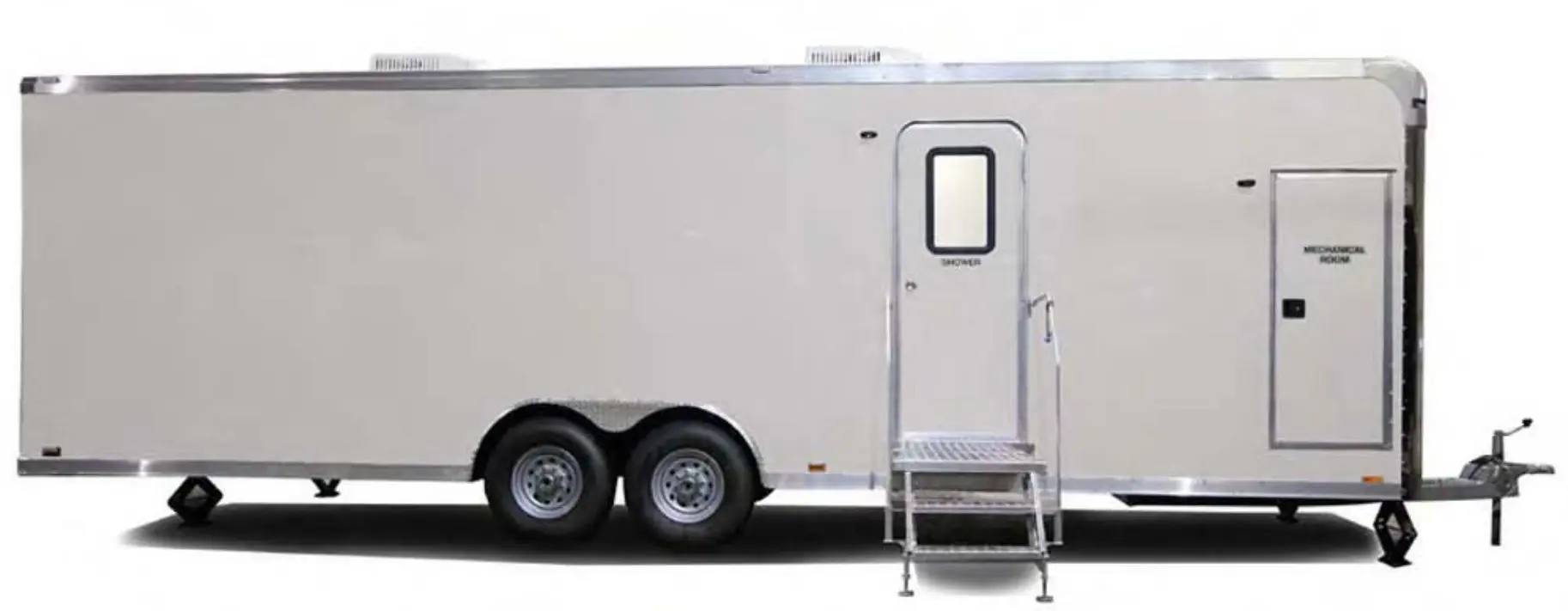 A large white shower restroom trailer with two doors, metal stairs leading to one entrance, and dual wheels, parked on a plain background.