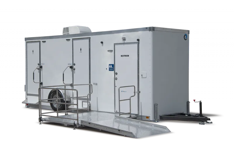 The ADA+2 Restroom Trailer (20' x 6') features an accessible ramp and three labeled doors, shown on a white background.