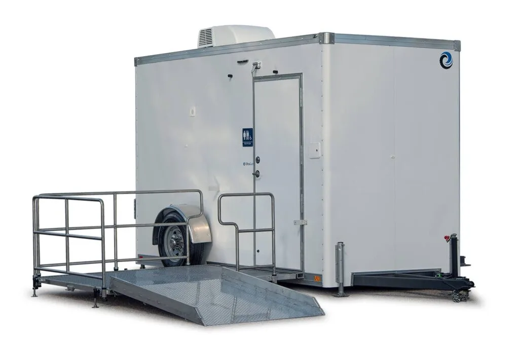 The ADA Single Restroom and Restroom Shower Trailer features a wheelchair-accessible ramp, exterior door, and roof ventilation unit, shown against a white background.