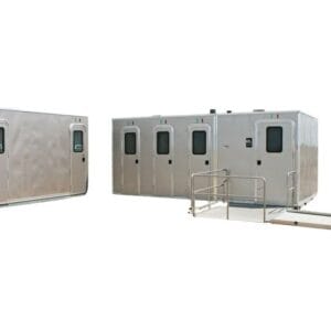 The CI 8 - 1 Stall ADA Restroom Skid (8 ft) is a portable trailer with a metallic exterior, featuring a single accessible unit equipped with an accessibility ramp.